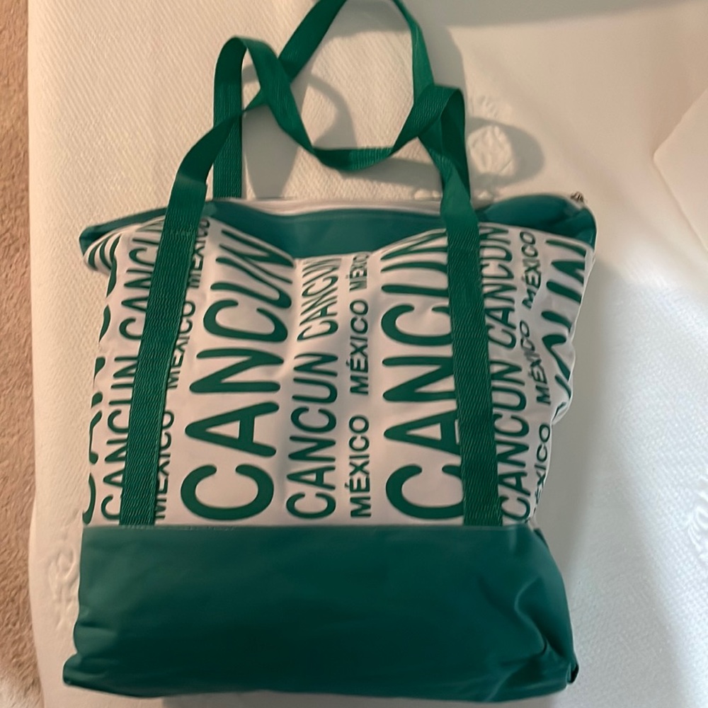 Teal tote with zippered closure